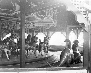 Apr. 26, 1984 The carousel horses, dinosaur and hippo gaze in disbelief at the inferno beside them.