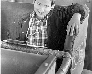 Idora Auction: Last time to sit in the Wilcat cars. The boy is from Chagrin Falls, Oh. Oct. 20, 1984