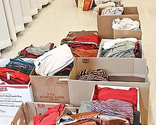 Donated cloths have been categorized into boxes at Austintown Middle School. Austintown Council of PTA's organized the clothing drive, Tuesday April 28, 2009