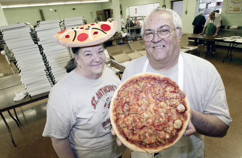 Steve and Marian DeGenaro in the kitchen at St Anthony Church in Youngstown Friday 4-24-09. They and about 25 volunteers make and sell several hundred pizza's/week as a church fundraiser.
