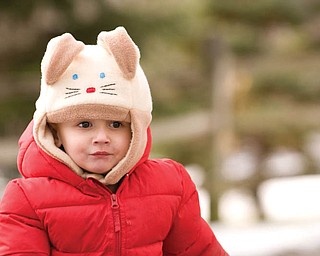 ALEX LAPLANTE wears his bunny hat while enjoying some late-season sledding
at the Poland Presbyterian Church.