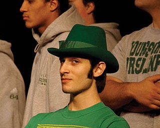 JOEY PASCARELLA of Youngstown, a senior at Ursuline High School, was full of school spirit as he wore the mascot’s leprechaun hat for a send-off rally for the football team’s state championship game last November, which the Fighting Irish won.