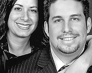 Lisa M. Cambert and Dr. Lucas W. Henn