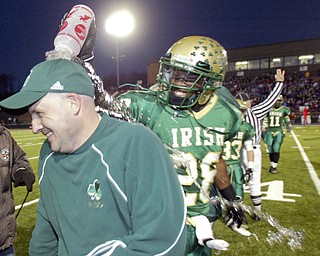 Ursuline High School Coach Dan Reardon gets doused by player Allen Jones during final moments of State championship win 112/29/08 in Massilon. William D. Lewis / The Vindicator