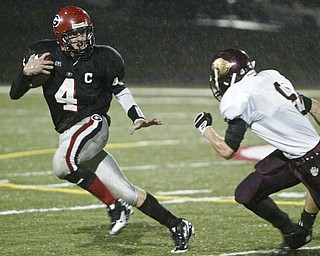 Giard High School quarterback Kyle Stadelmyer scrambles during an October 23, 2008 game with Liberty . William D. Lewis/ The Vindicator