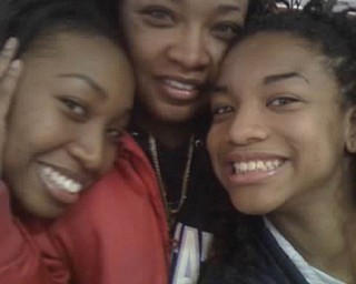 Londa Tubbs, 40, with her daughters, Sonya, 21, left, and Terisa, 17. They all live in Youngstown.