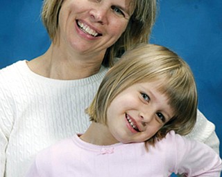 Former Coitsville Township resident, Cheryl (Bunofsky) Aughton, 44, and Gabriella Aughton, 4 , of Gibsonia, Pa.