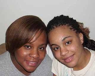 Crychelle Portis-Hurlbert, 32, and Crystal Portis, 17, of Youngstown.