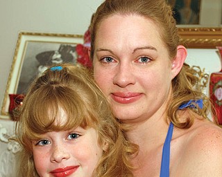 Heather Brocious, 25, and Autumn, 7, of Canfield.