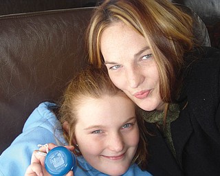 Carly Roman, 26, and Zoë Roman, 11, of Masury.