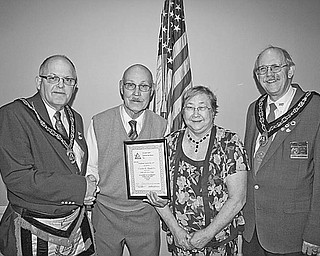 <p>Special to The Vindicator</p>
<p>PROUD MOMENT: A highlight of a recent meeting of the Grand Council of Royal and Select Masons of Ohio, Buechner Council 107, was the selection of Charles H. Houck Sr. as its “Man of the Year.” Sharing the proud moment with Houck, second from left, are, from left, Robert Rhinehart; Houck’s wife, Judy; and James Parker VI.</p>