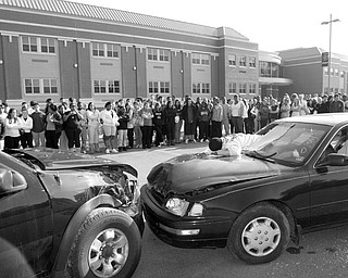 THIS COULD BE YOU: A mock crash staged for New Castle High School students Tuesday provided an example of what can happen when teens drink and drive, and don’t wear a seat belt. Seniors at the school portrayed accident victims.