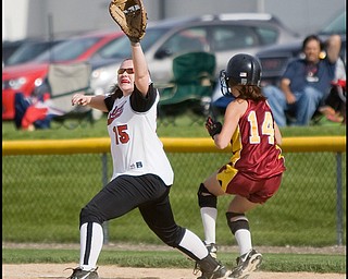 5.14.2009
Cardinal Mooney's Macy Ucchino (14) beats the throw to Canfield's Carlee Hart (15) landing safely at first base during the bottom of the fifth inning at Boardman's Field of Dreams on Thursday evening.
Geoffrey Hauschild