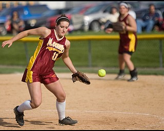 5.14.2009
Cardinal Mooney's Cadi Sheffler (11) goes after a bobbled ball during the top of the sixth inning at Boardman's Field of Dreams on Thursday evening.
Geoffrey Hauschild