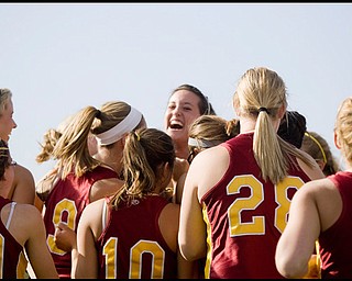 5.14.2009
Cardinal Mooney's Cadi Sheffler (11) celebrates with her teammates after pitching a defeat over Canfield in softball at Boardman's Field of Dreams on Thursday evening.
Geoffrey Hauschild