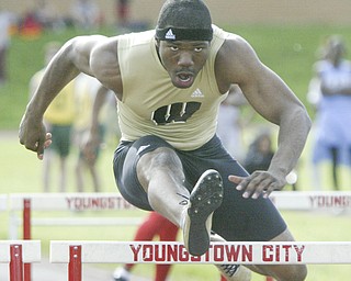 Harding's Marvin Logan competes in 110 hurdles Thursday at Chaney.