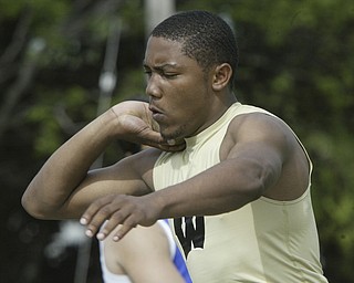 Harding's Aaron Wilson throws the shot during Thursday meet at Chaney.