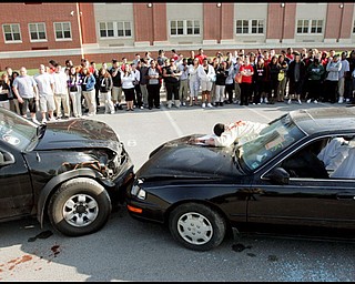 5.12.2009
New Castle HS senior students portrayed accident victims during a mock prom night accident at the school Tuesday morning. The mock accident was to demonstrate the dangers of drinking and driving .