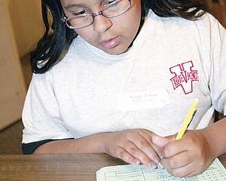 Mikayla Roberts, LaBrae Middle School 5th grader, competes in Equation event Tuesday.