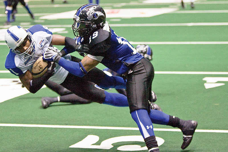 Wilkes Barre-Scranton Pioneers' Irving Campbell (81) and Mahoning Valley Thunder C.J. Brewer (19) at Cheverolet Centre May 8, 2009.