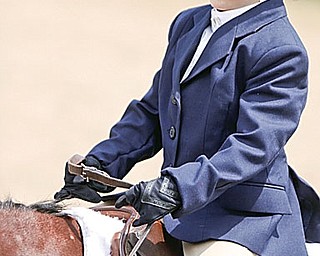 Lauren Yohman of Canfield competes in the Small Fry Hunter under Saddle 9 & Under event for the Northern Ohio Quarter Horse Association Novice Extravaganza at Canfield Fairgrounds.