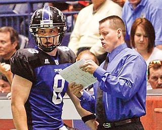 New Thunder coach Chris MacKeown talks to Blake Powers 8 at Covelli Centre, Saturday May 30, 2009.