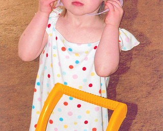 Dressed for shopping is EMILY TESSEAN, 2 1/2 daughter of Shawn and Janine Tessea of Parma Heights. Local grandparents are Lil and Howard Tessean.