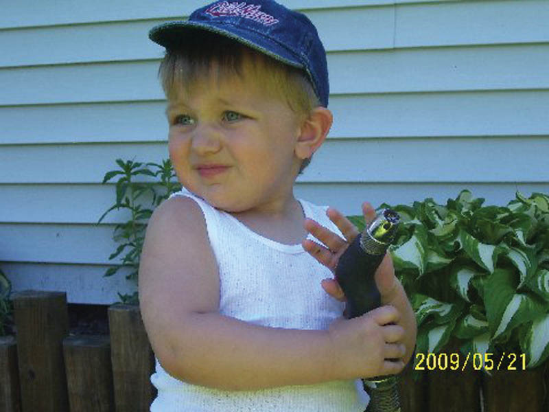 JUSTIN BISH of Hubbard, who will turn 2 on Tuesday, posed for his grandmother, Pam Filo of Hubbard.