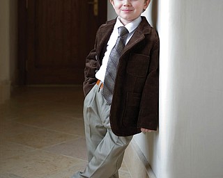 This is a picture of BENJAMIN DEWBERRY, 4, of Youngstown, when he attended the wedding of his uncle, Josh Beniston, on a Saturday.