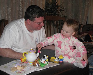 ROB WARDLE of Youngstown with daughter MAGGIE ROSE in their Saturday suits — Guiness T-shirt for dad and piggie sleeper for daughter. (Submitted by mom/grandma Marg Yannucci of Youngstown.)