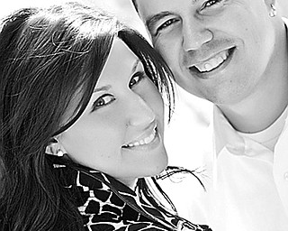 Julie A. McLhinney and Jesse P. Poklemba