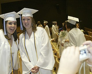 Poland seniors Kati Hartwig, left, and Beth Ann Yoblonkai pose for a pix before the Sunday commencement ceremony.