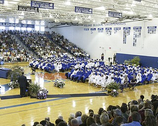 The Senior Seminary Singers, a Poland HS vocal group, perform " Until We Sing Again" during Sunday commencement ceremony.