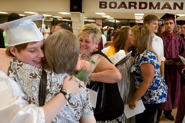 6.7.2009
Brielle Retha Campos hugs her grandmother Nancy Whitmore as her mom, Kim Campos, smiles in the background following Boardman's commencement ceremony at Boardman High School on Sunday afternoon.
Geoffrey Hauschild