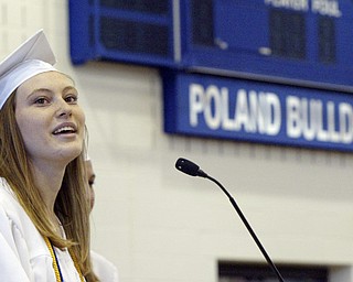 Poland HS valedictorian Christina Rogers delivers her speech during Sunday commencement at the Poland HS fieldhouse.