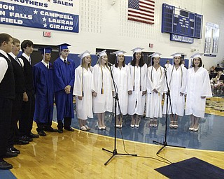 The Senior Seminary Singers, a Poland HS vocal group, perform " Until We Sing Again" during Sunday commencement ceremony.