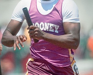 Mooney's Matt McWilson competes in the 4x100m relay on Saturday afternoon.