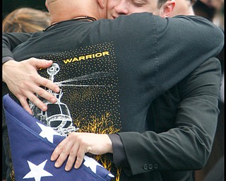 The funeral of Army Chief Warrant Officer S. Blane Hepfner at Hubbard Union Cemetery.