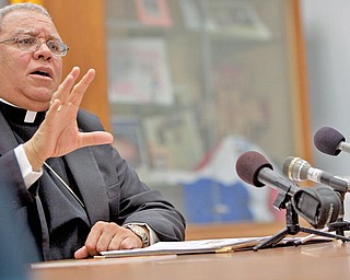 Bishop George Murry speaks to the media at the Chatholic Diocese of Youngstown on Tuesday afternoon.