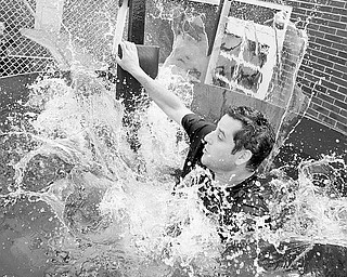 Principal Mike Massuci in a dunking booth.