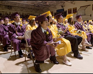 6.13.2009
Jared Ausnehmer his fellow graduates in the class of 2009 at the South Range commencement ceremony in the school's gymnasium on Saturday afternoon.
Geoffrey Hauschild