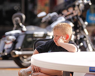 Zayne Gause (5) of Youngstown listens to Tie 1 On at West Federal Plaza for "Rally in the Valley" Sunday June 14, 2009
Lisa-Ann Ishihara