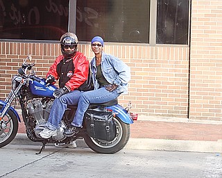 James and Kim Mitchell of Youngstown sit on their Harley Davidson 883 sportsters and listen to Tie 1 On at "Rally in the Valley" Sunday June 14, 2009
Lisa-Ann Ishihara