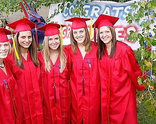 Sam Shiley, BreAnna Remias, Miranda Weaver, Rory Sachire and Samatha Custer pose for photos at Austintown Fitch High School after their Class of 2009 commencement Sunday June 14, 2009
((namesOK)
Lisa-Ann Ishihara