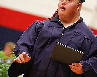 Kenneth Wilcox walks away from the stage with his diploma at Austintown Fitch High School's Class of 2009 commencement Sunday June 14, 2009
Lisa-Ann Ishihara