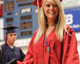 Kylie Arnett smiles at her family after crossing the stage to receive her diploma at Austintown Fitch High School's Class of 2009 commencement Sunday June 14, 2009
Lisa-Ann Ishihara