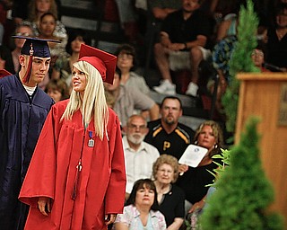 Kylie Arnett says a couple quick words to Jason Bagoly before she crosses the stage to receive her diploma at Austintown Fitch High School's Class of 2009 commencement Sunday June 14, 2009
Lisa-Ann Ishihara