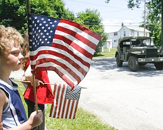 Sara and Robert 8 and 9 respectively ( Buskirk ) wave old glory as the MVPA 2009 Transcontinental Motor Convoy arrives in East Palestine Monday afternoon - robertkyosay