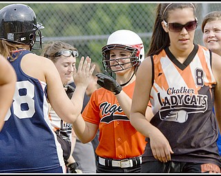 6.16.2009
Howland's Jena Debiec (13) hits the first of back to back homeruns during the top of the fifth inning at Candlelite Knolls in Bazetta Ohio on Tuesday afternoon.
Photo by: Geoffrey Hauschild