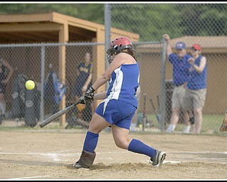 6.16.2009
Maplewood's Emily Paris (8) hits the second of back to back homeruns during the top of the fifth inning at Candlelite Knolls in Bazetta Ohio on Tuesday afternoon. The previous homerun being hit by Howland's Jena Debiec (13).
Photo by: Geoffrey Hauschild